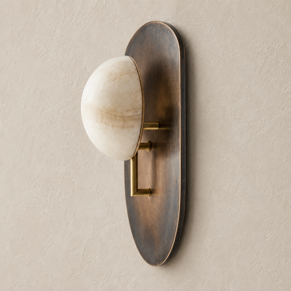 Side view of the alabaster brass shield wall sconce, showing its wall mounting and projection.