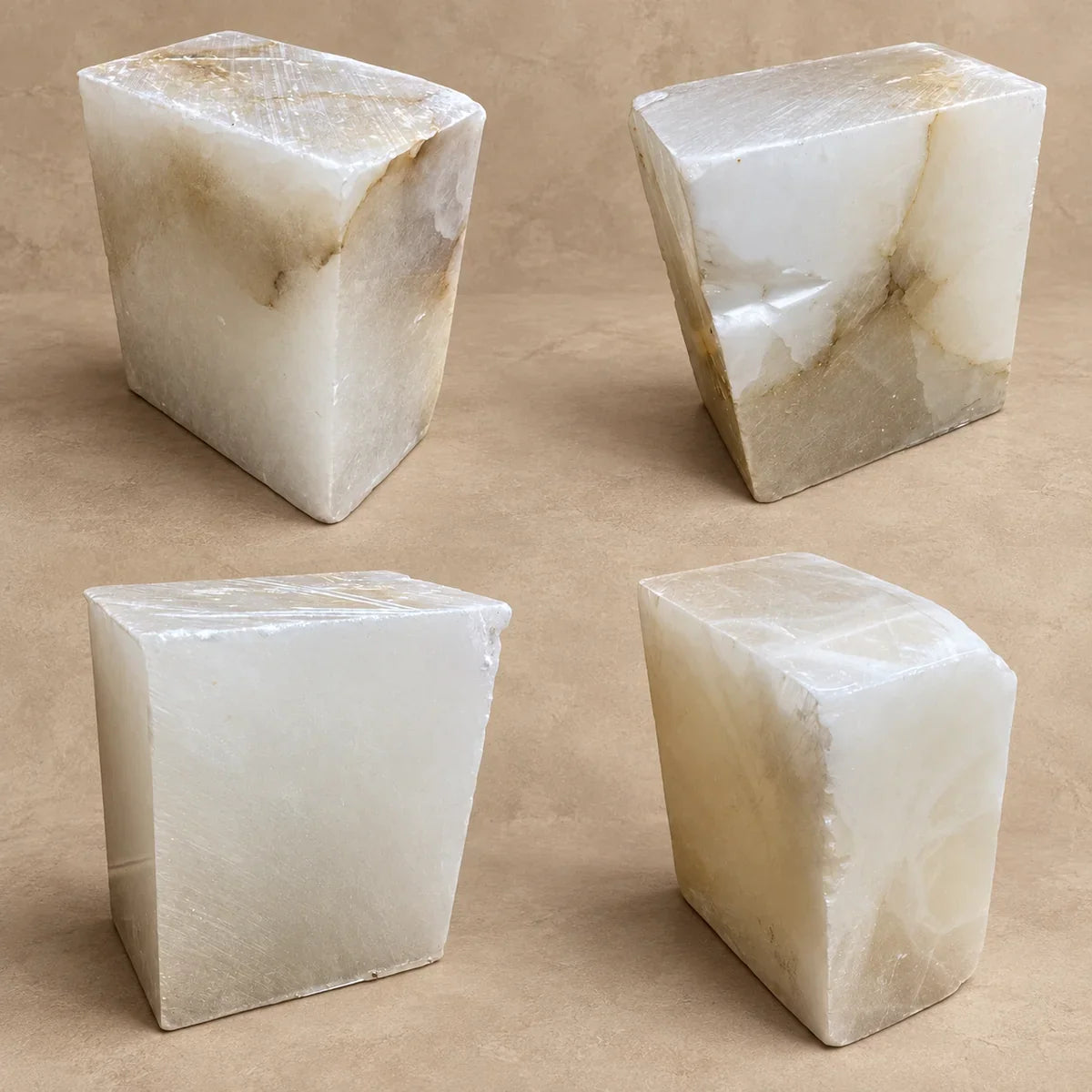Natural alabaster blocks showing variations in cloudy colour and mineral bands.