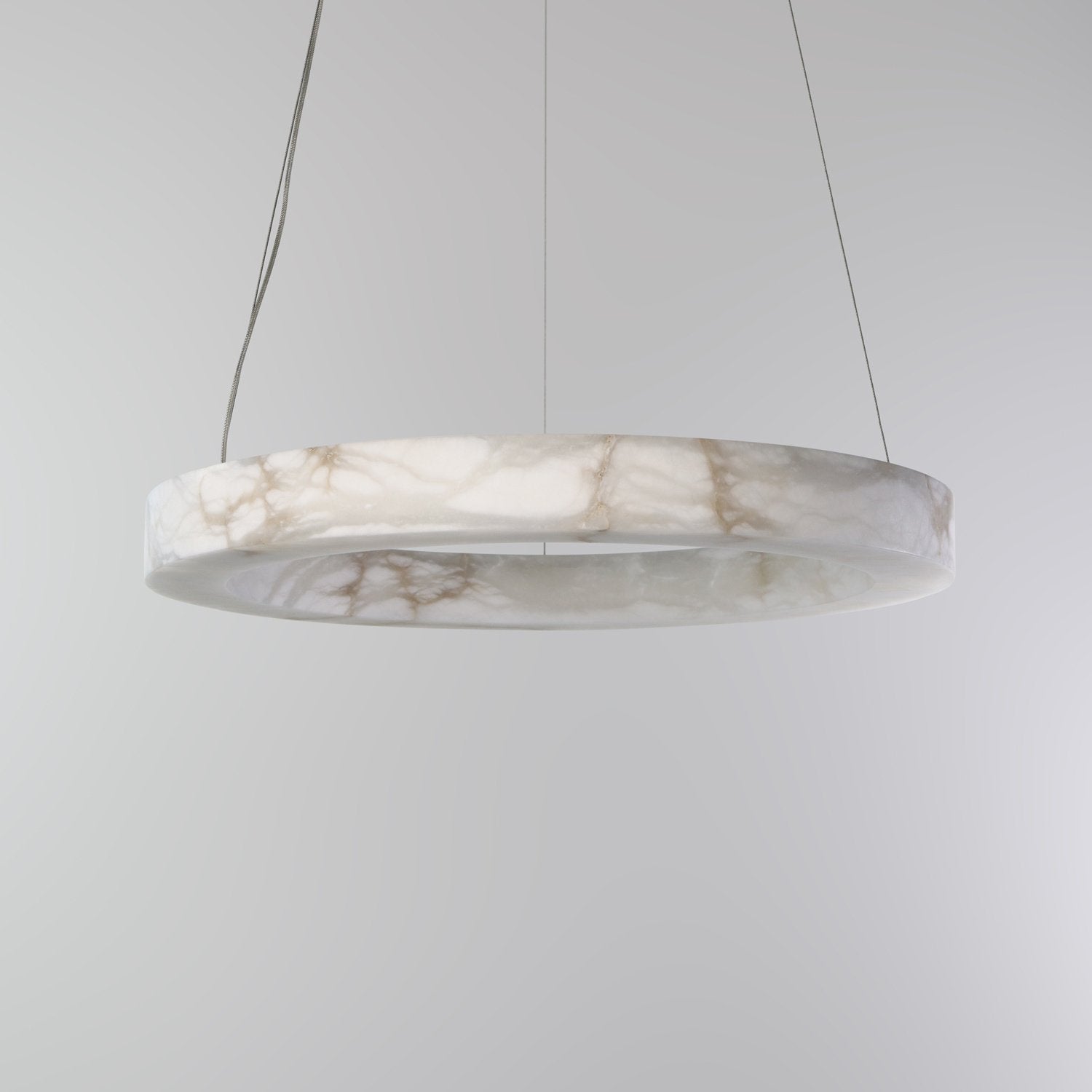 Alabaster ring chandelier over a kitchen island