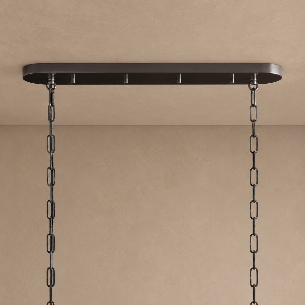 Black ceiling canopy and twin suspension chains for the Bellatrix Long chandelier.