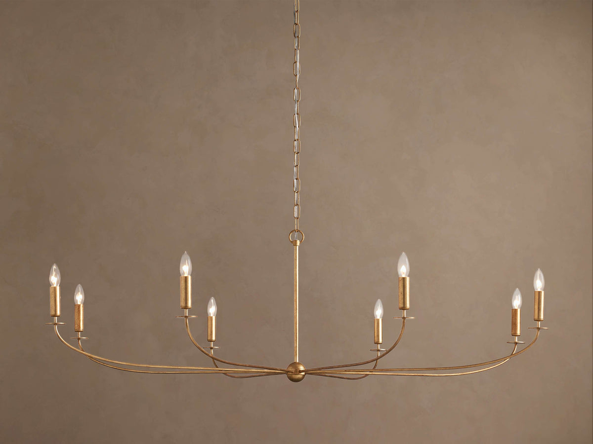 Brass candelabra chandelier in an antique gold finish with slender curved arms, front view