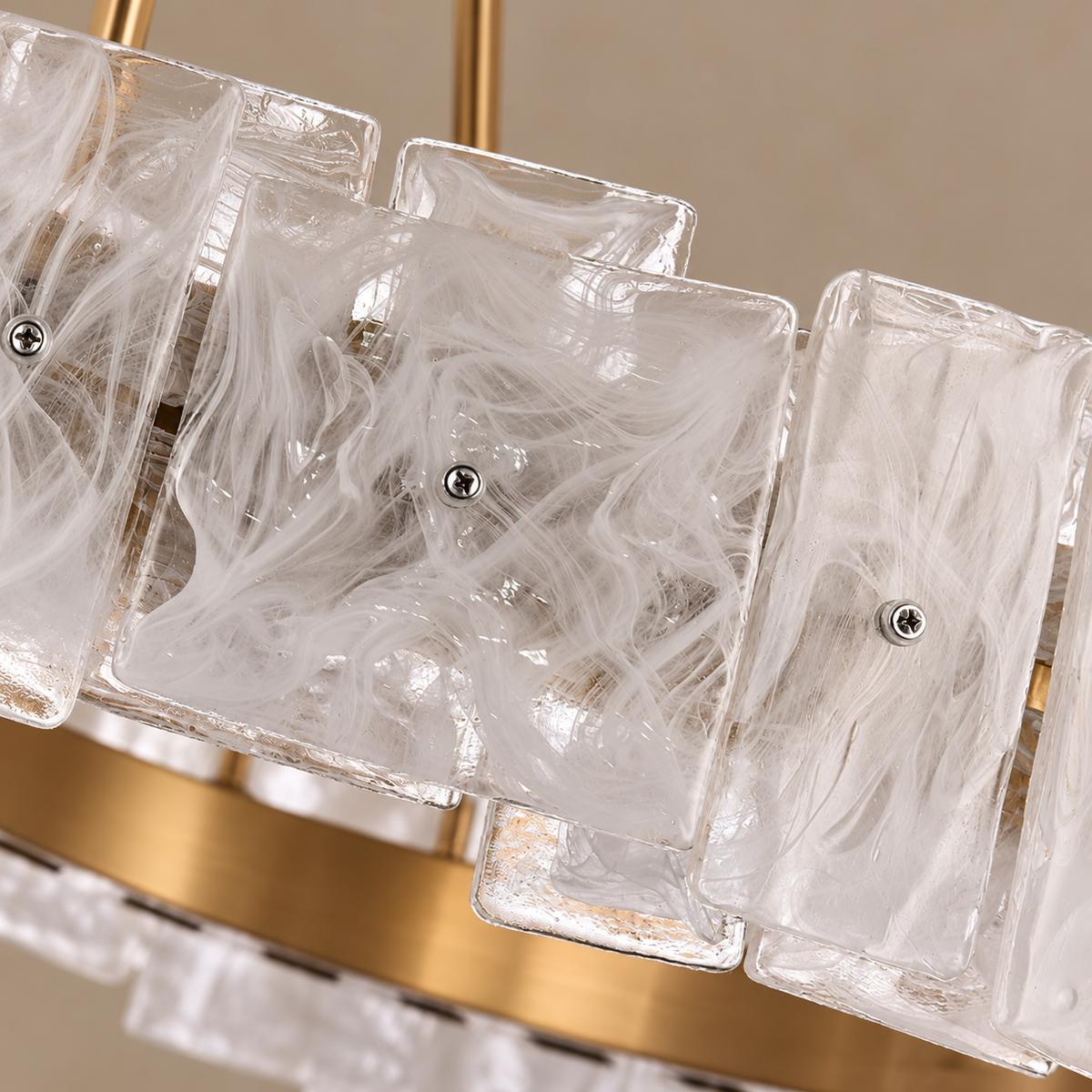 Close-up of CX Carine’s white-streaked glass panels, silver fixings and gold-tone ring