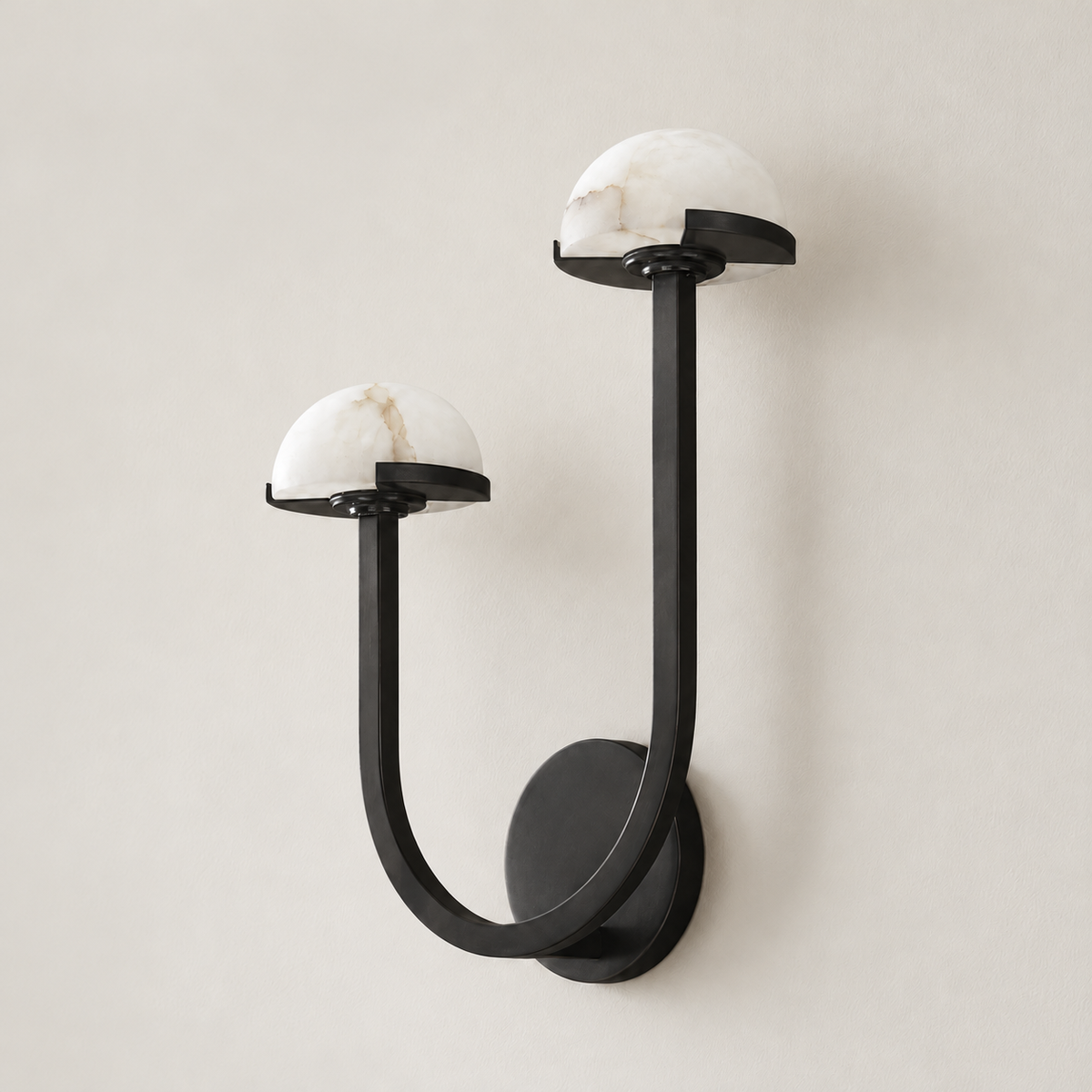 Right-hand double alabaster wall sconce in black steel, switched off.