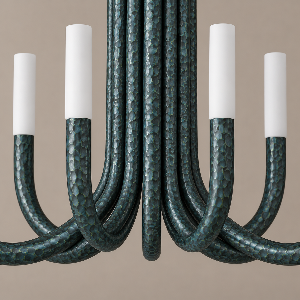 Close-up of the Grand Green Candelabra’s textured blue-green metal arms and white diffusers