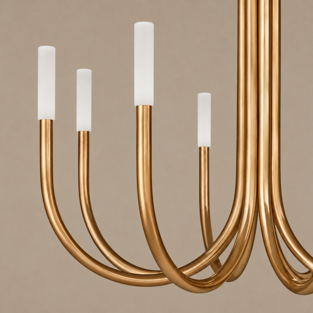 Close-up of the Grand Brass Candelabra’s curved metal arms and white cylindrical diffusers