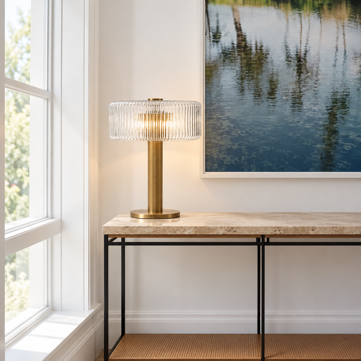 Ribbed glass table lamp on a stone entryway console