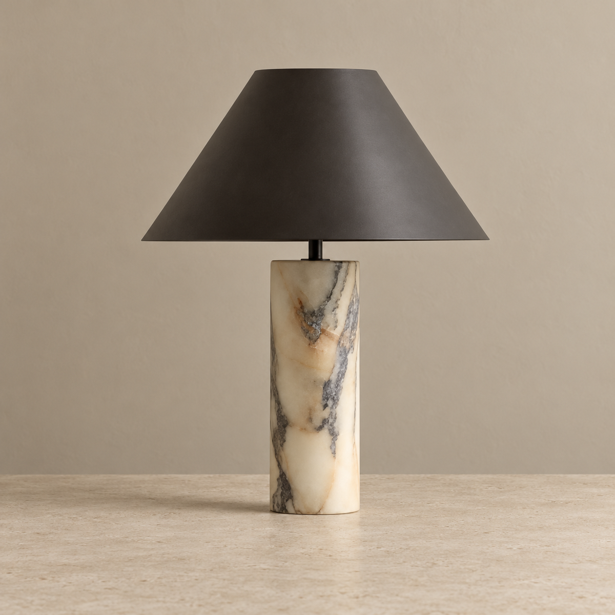 Unlit black conical shade above a pale marble lamp base.
