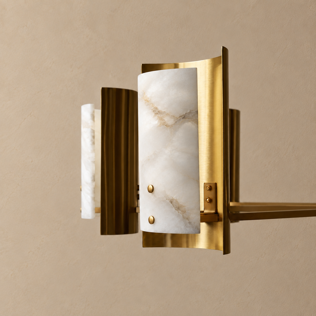 Curved alabaster panel with brass shield, bracket and fixing pins.