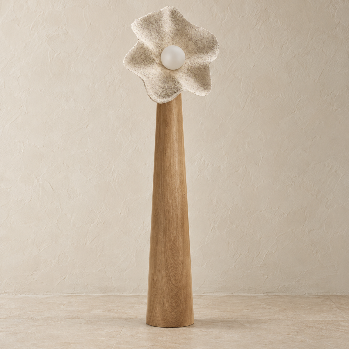 Large Petal floor lamp with a textured resin flower shade and tapered wood column, switched off.