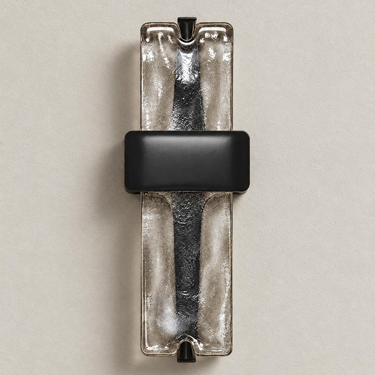 Close view of cast glass texture and black central cover.