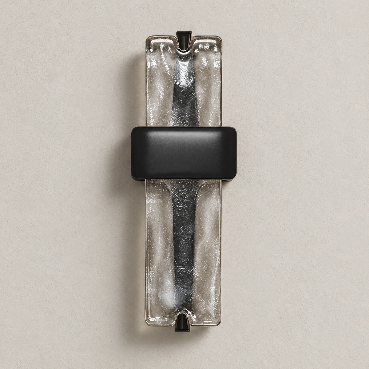 Textured clear glass wall sconce with black hardware, switched off.