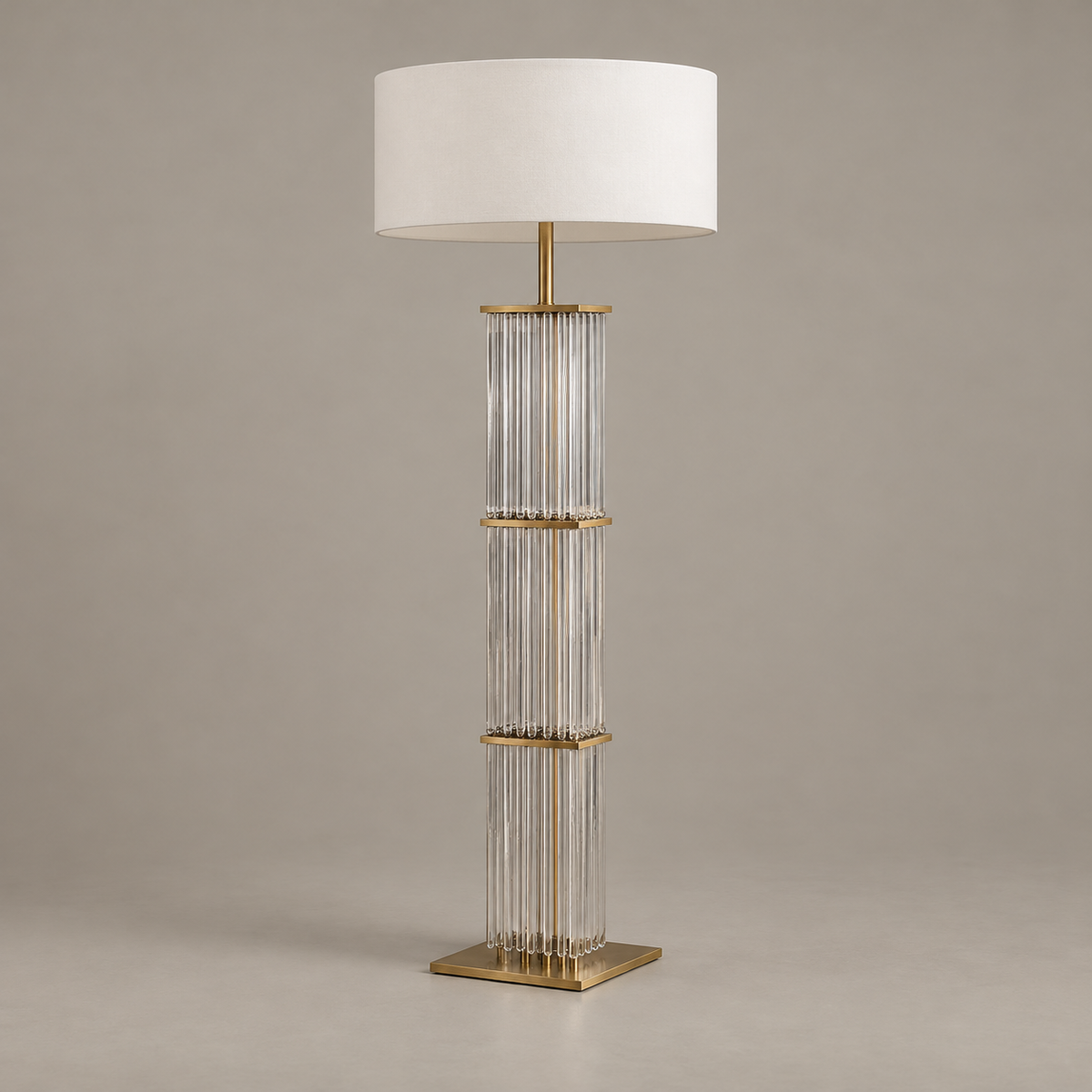 CLGT025 floor lamp switched off, with three glass-rod sections, brass dividers and a white drum shade.