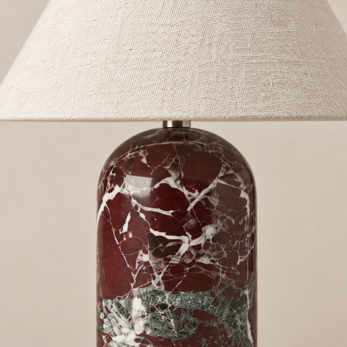 Detail of the red marble base and ivory linen shade.