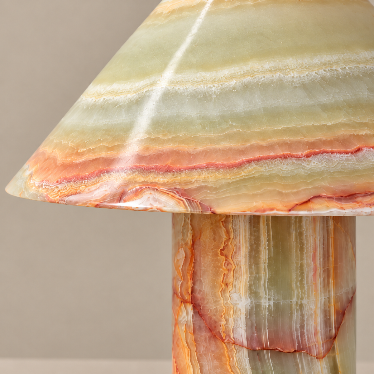 Natural bands across the stone shade and base
