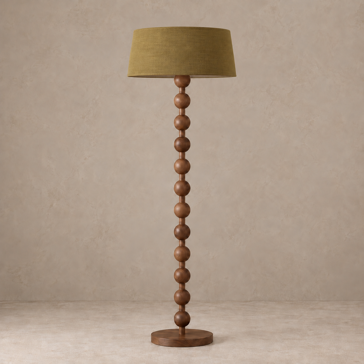 Sirmione Walnut Floor Lamp with olive linen shade, unlit against a stone-beige background.