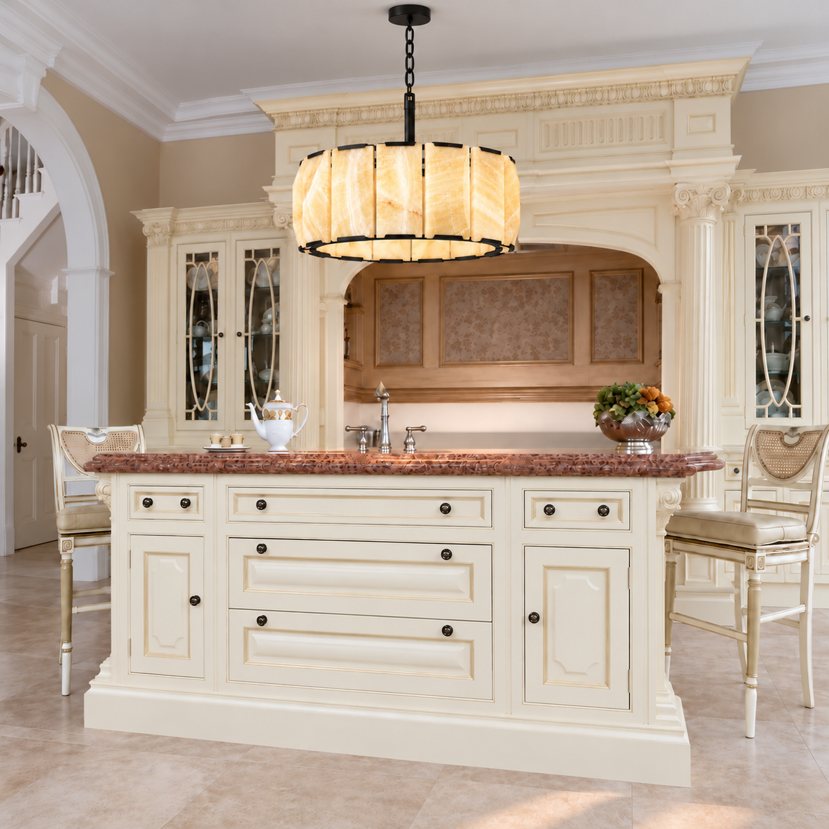 Honey onyx halo chandelier installed above a kitchen island.