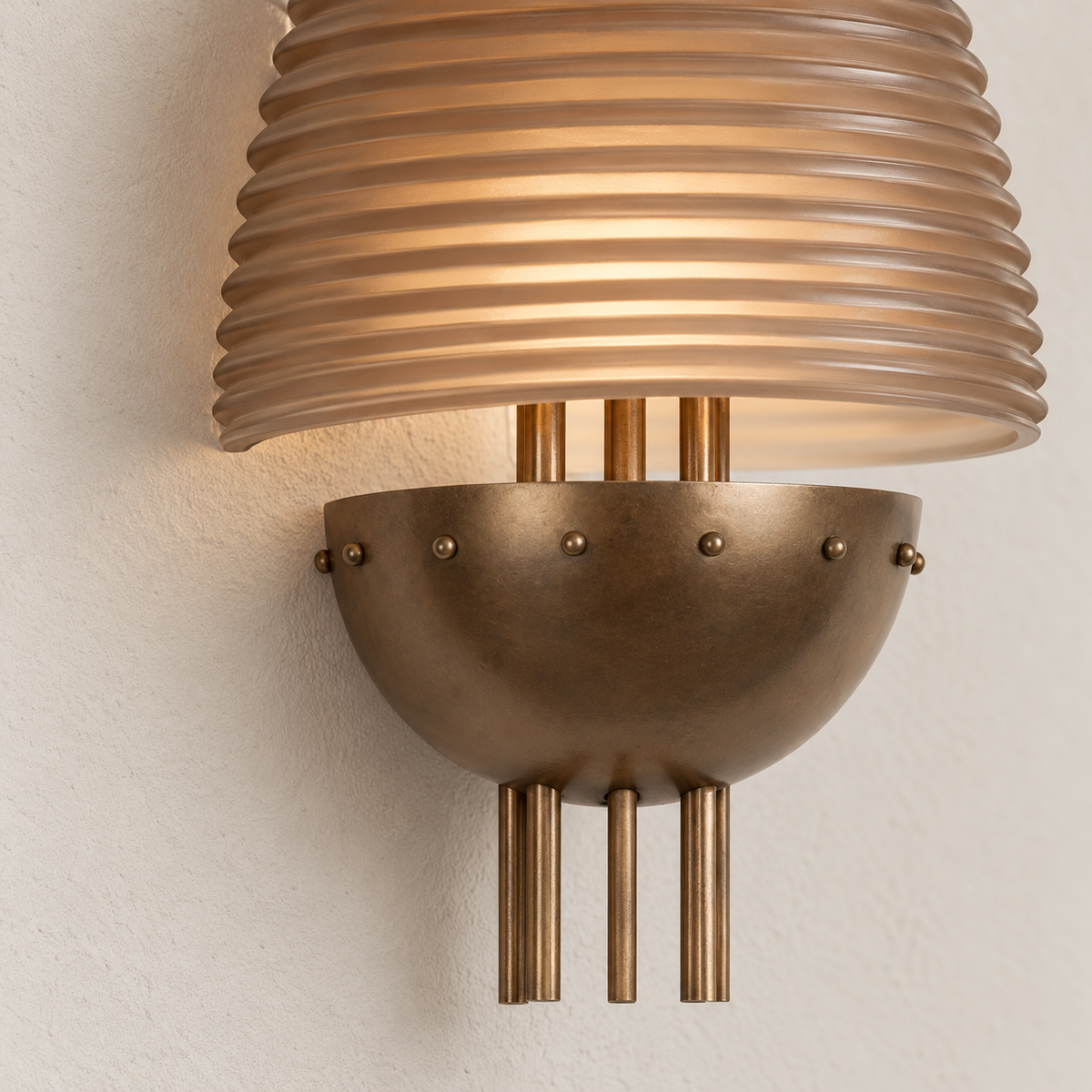 Close-up of the ribbed amber glass and antique copper bowl details.