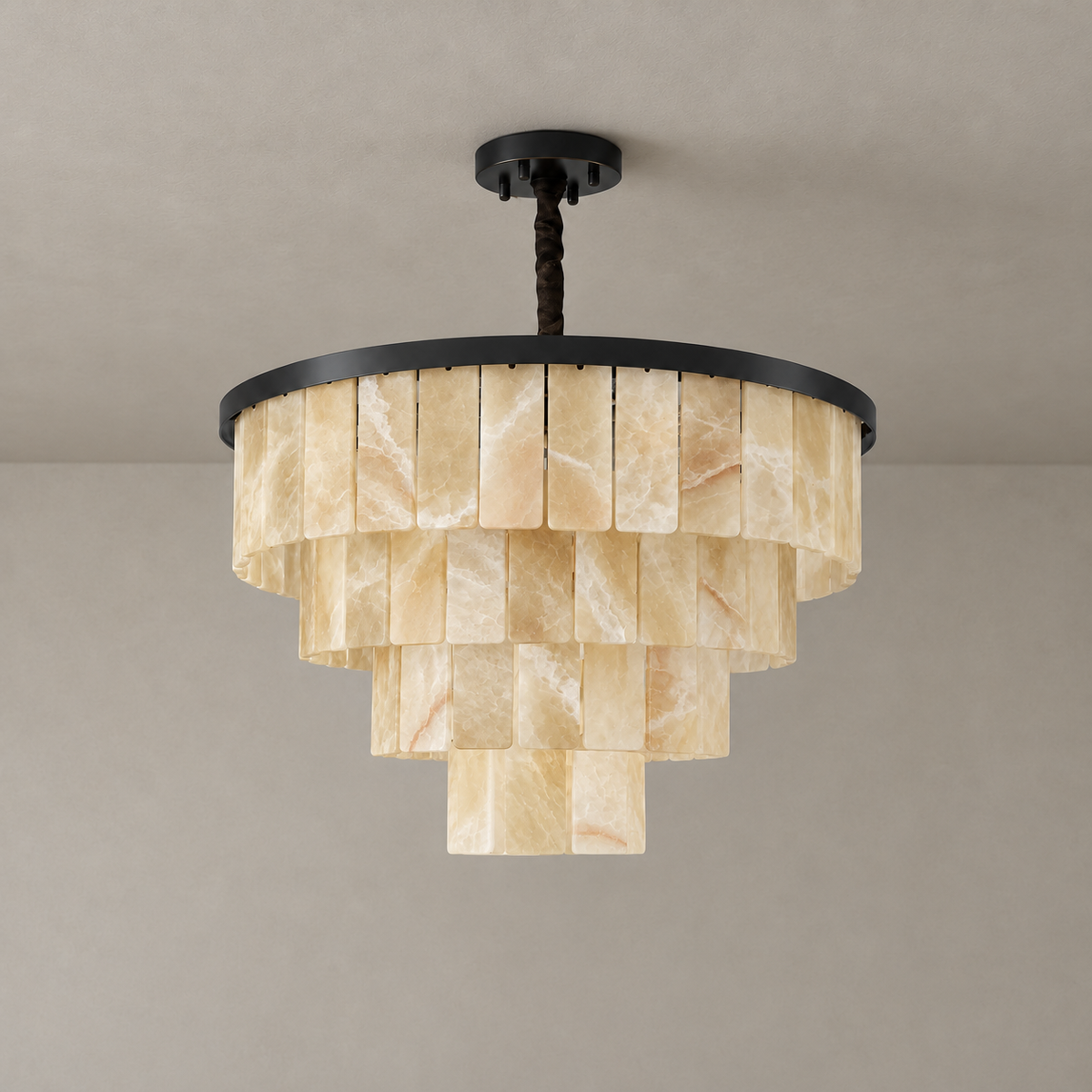 Four-tier honey onyx chandelier with black frame and ceiling canopy, switched off.