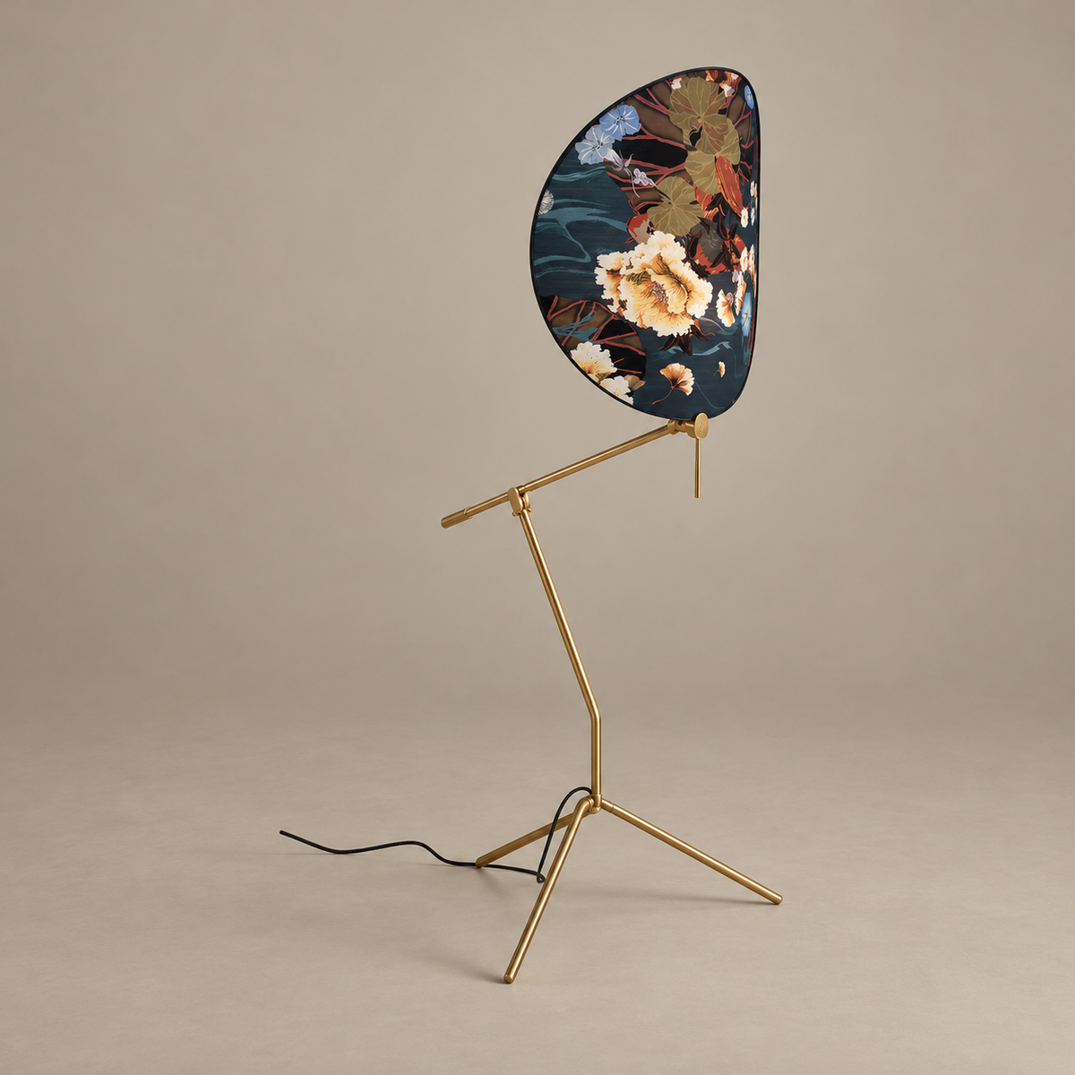 CLXDR025 floor lamp switched off, with a dark botanical glass shade and articulated brass frame.