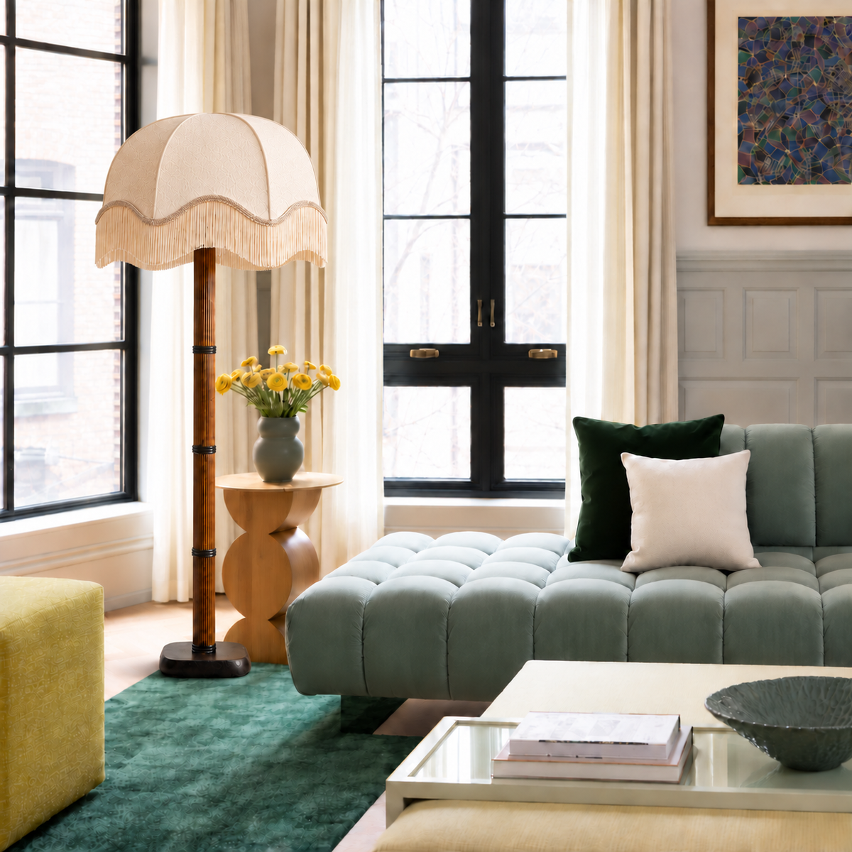 Galerie Fluted Column Floor Lamp with cream scalloped fringe shade in a furnished room.