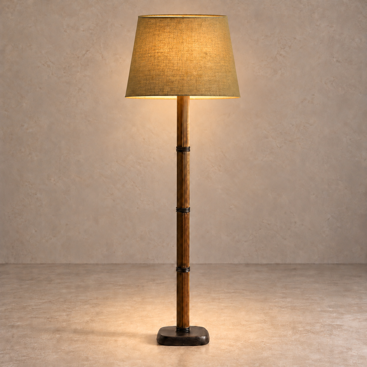 Galerie Fluted Column Floor Lamp with olive linen shade, illuminated in natural daylight.