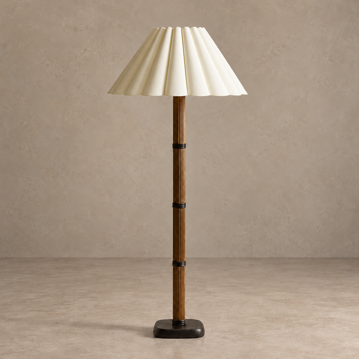 Galerie fluted column floor lamp with a broad cream sculptural pleated shade, switched off.