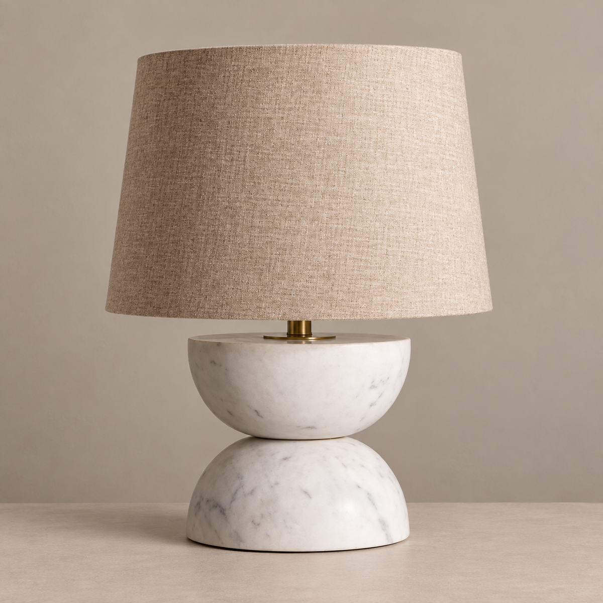 Zana table lamp with stacked white marble base and linen shade, unlit