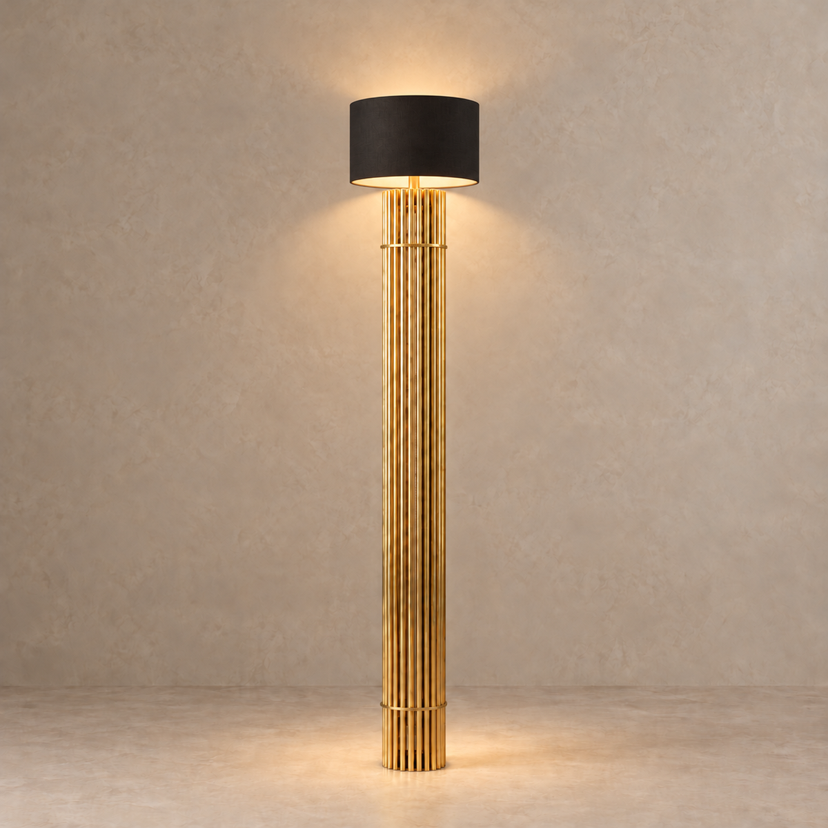 CLFGT0580 floor lamp casting warm light beneath its black fabric drum shade.