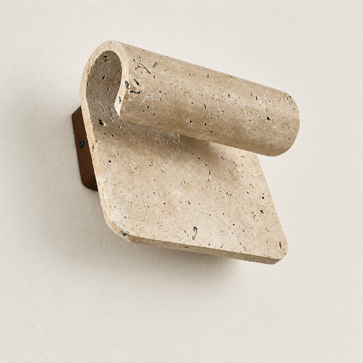 Side view of curved travertine wall sconce with a rolled upper edge.
