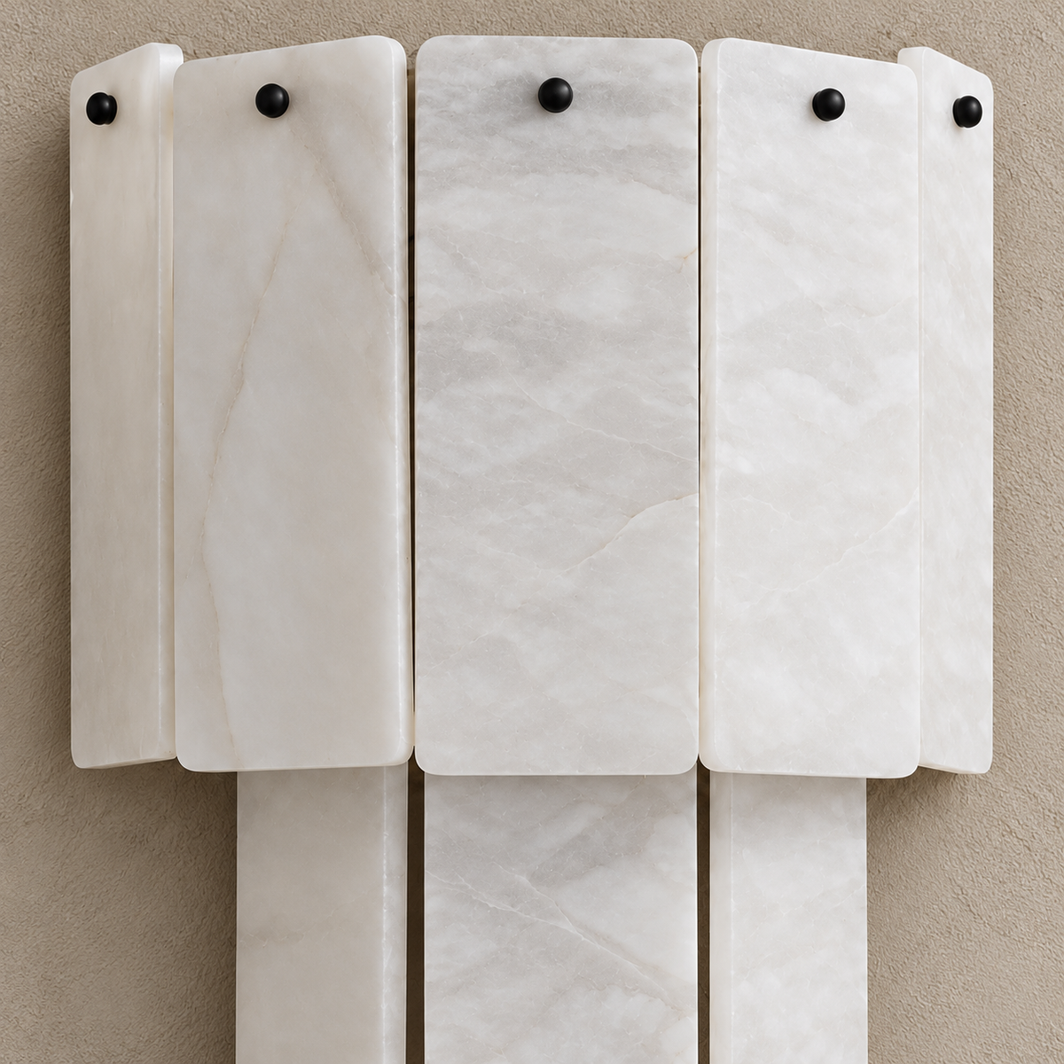 Detail of cloudy alabaster panels and black fasteners.