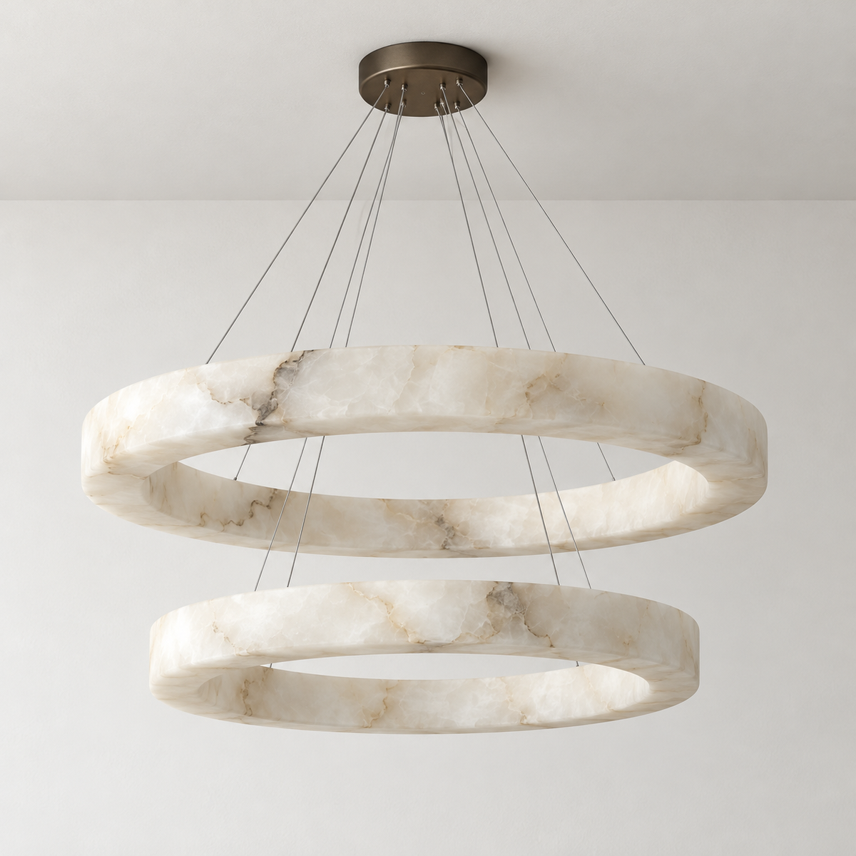 Double alabaster ring chandelier with black canopy, unlit; the upper ring is larger.
