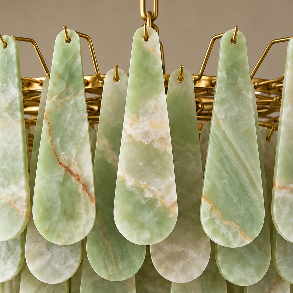 Close-up of one group of hanging teardrops and brass hooks on the CLXZ7410-GO.