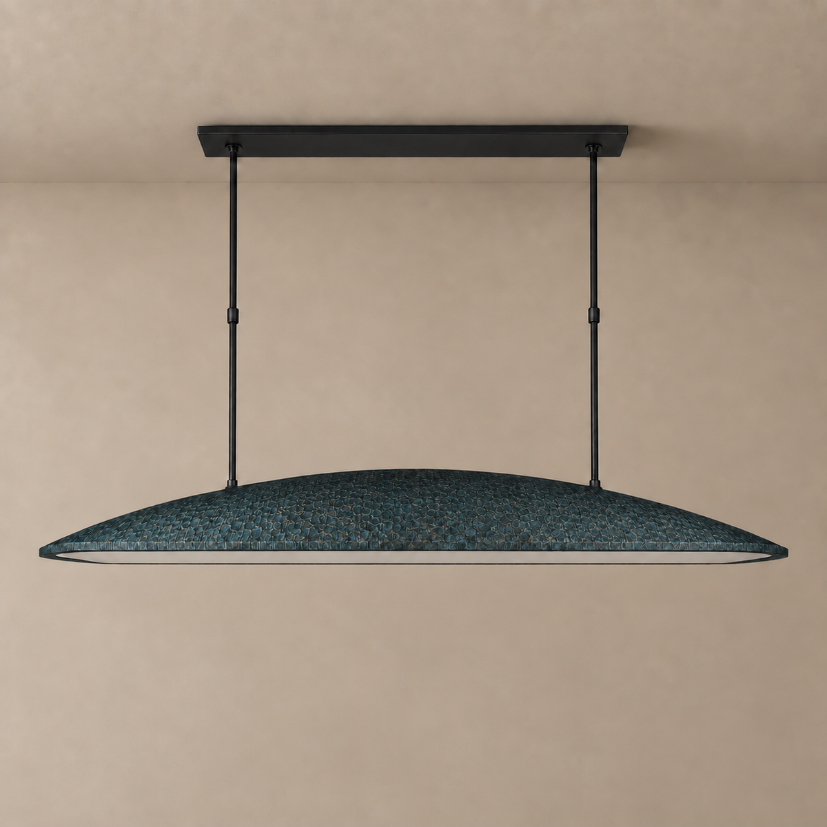 Green linear pendant light with a long oval stainless steel shade on two rods, unlit