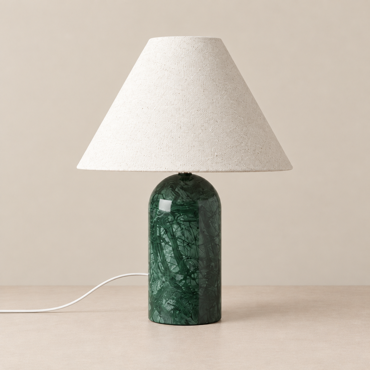 Green Marble Table Lamp, switched off, on a beige background.