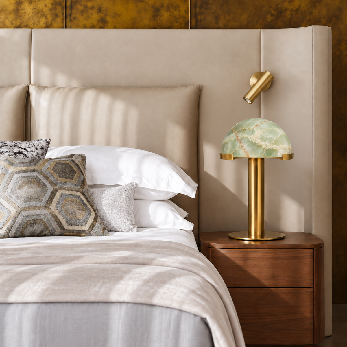 Green Onyx Dome Table Lamp with Brass on a walnut bedside cabinet, shown in natural daylight.