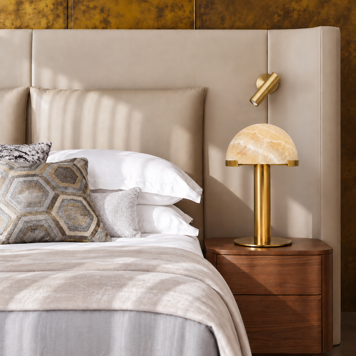 Honey Onyx Dome Table Lamp with Brass on a walnut bedside cabinet, shown in natural daylight.