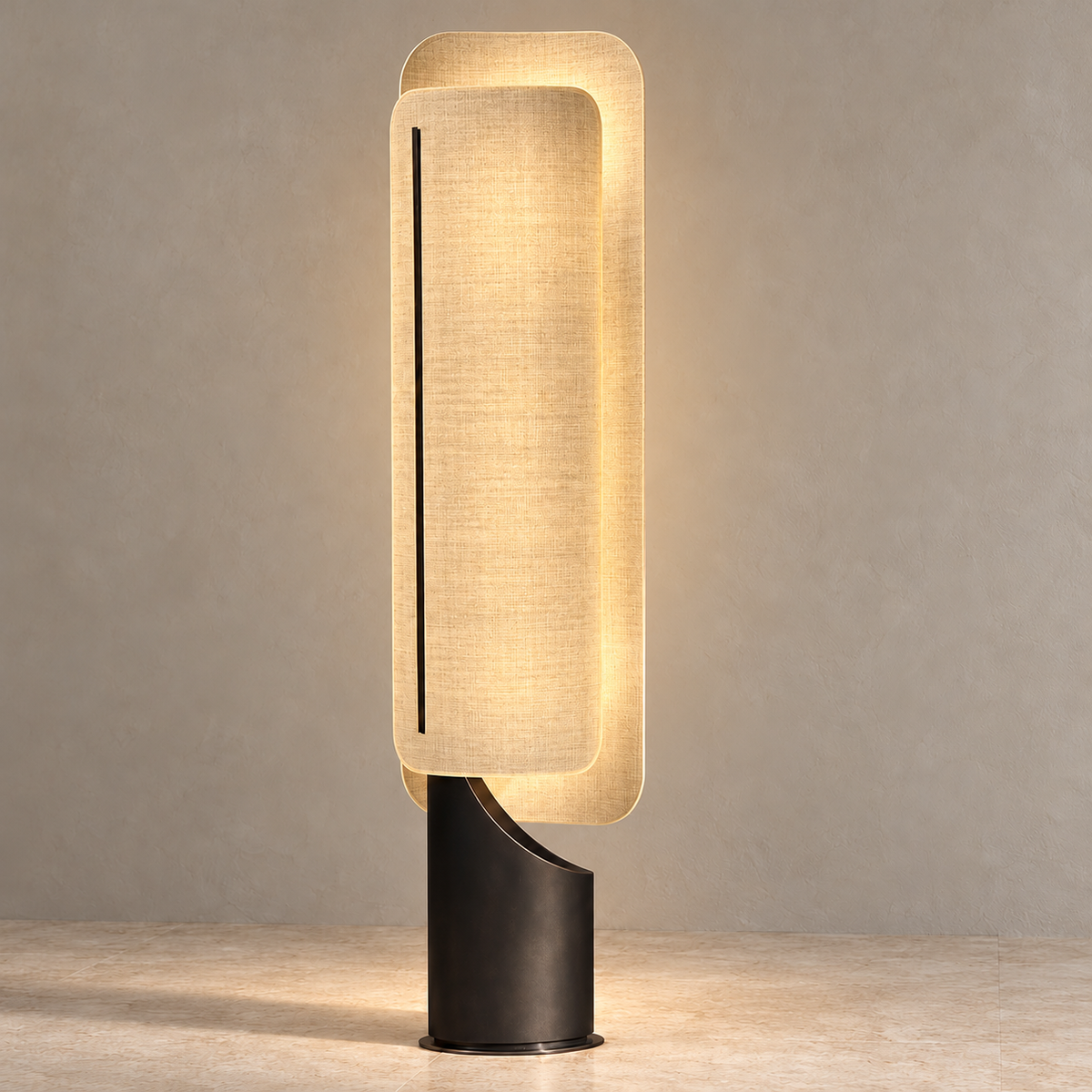 Maraki linen floor lamp illuminated with a soft glow through its overlapping shade panels.