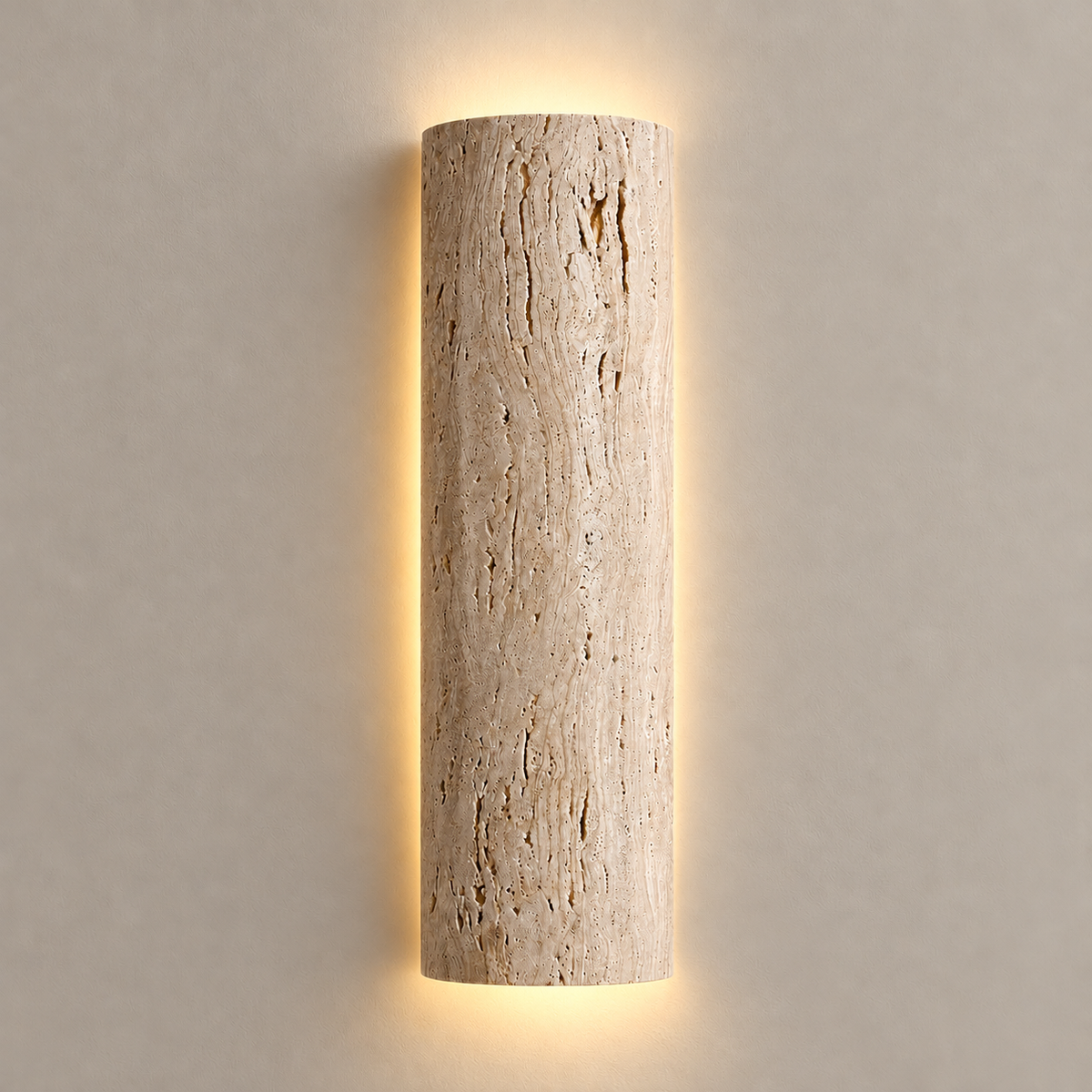 35 cm natural travertine wall sconce with warm light around the opaque stone.