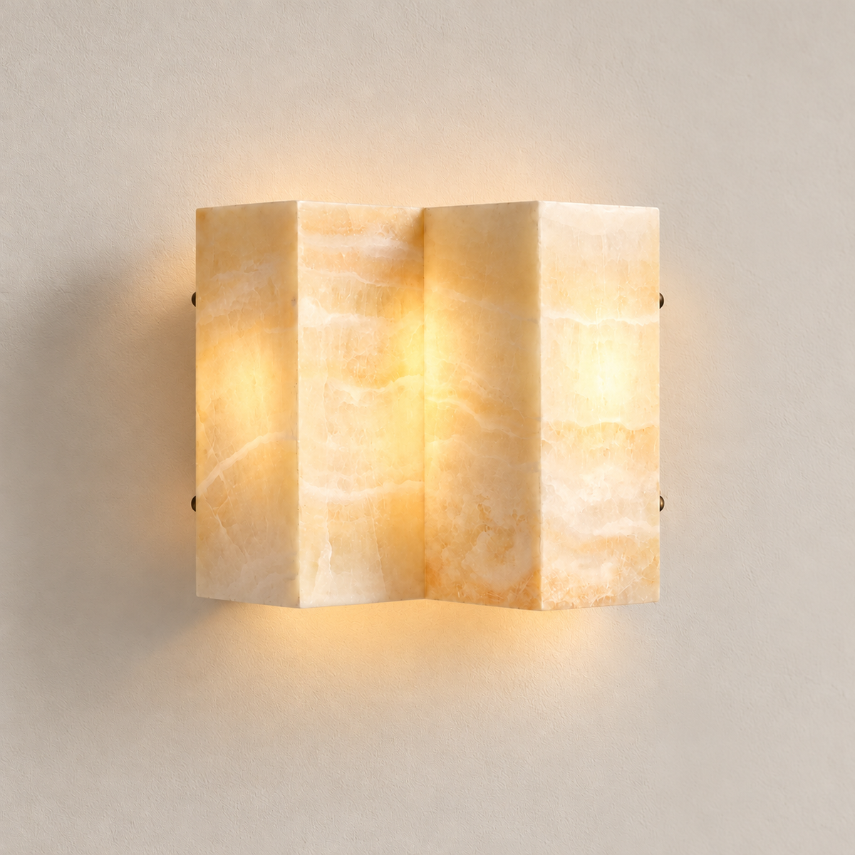 CLMZUP wide honey onyx wall sconce illuminated on the same warm ivory background.