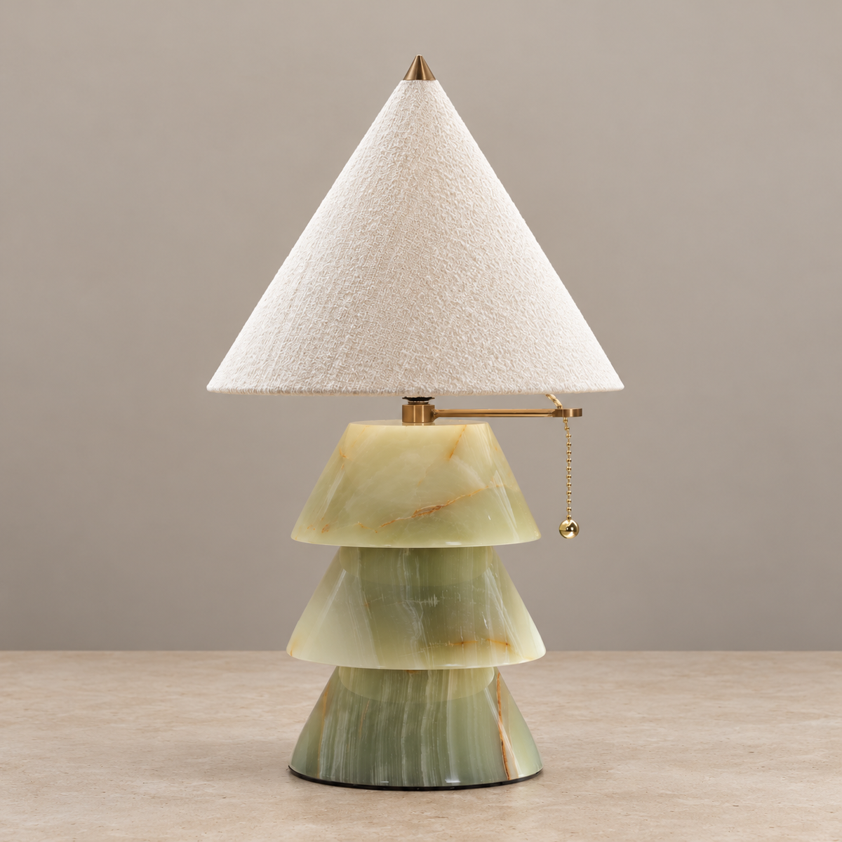 Pagoda jade-green table lamp switched off on a beige background