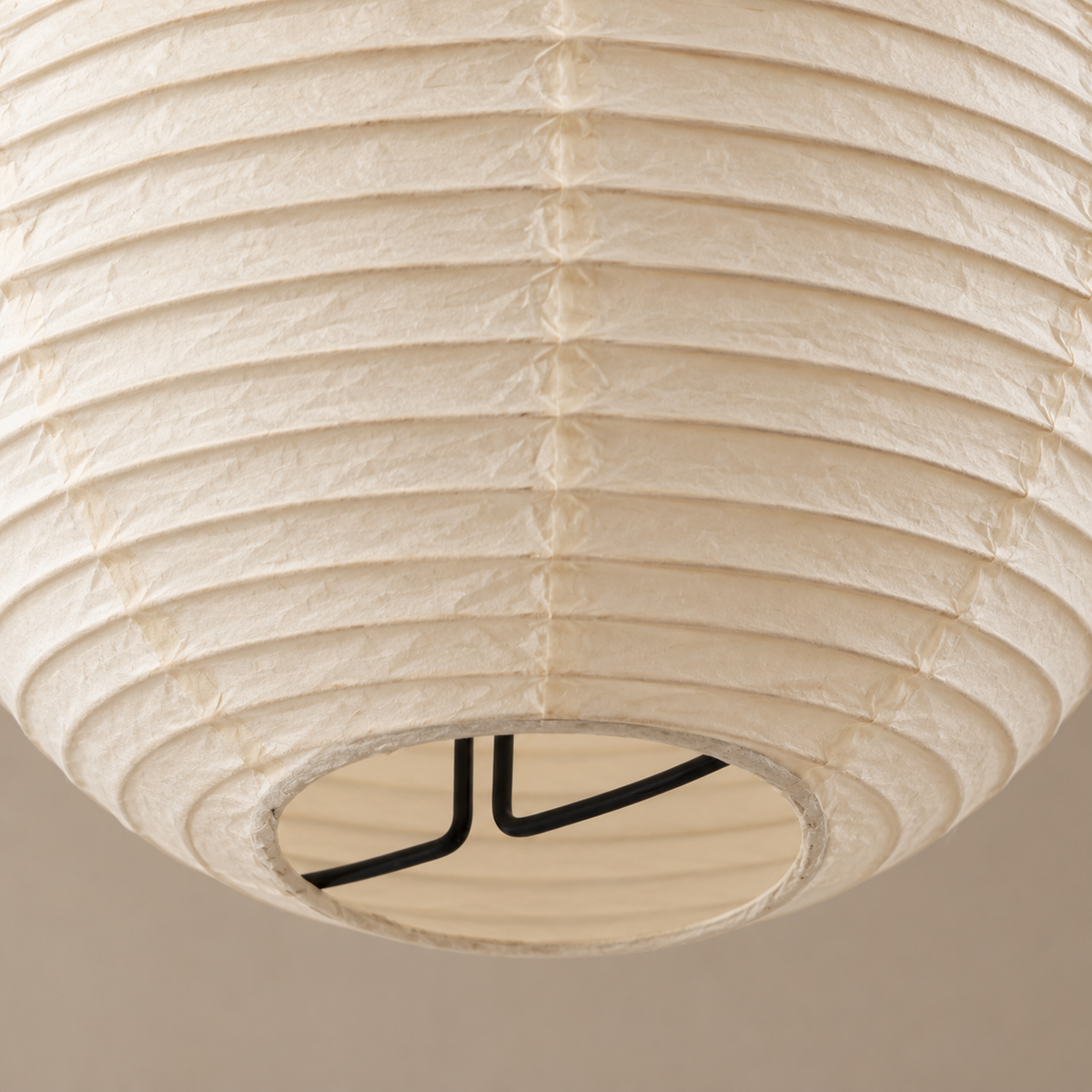 Close-up of natural rice paper, horizontal ribs and the lantern's lower opening