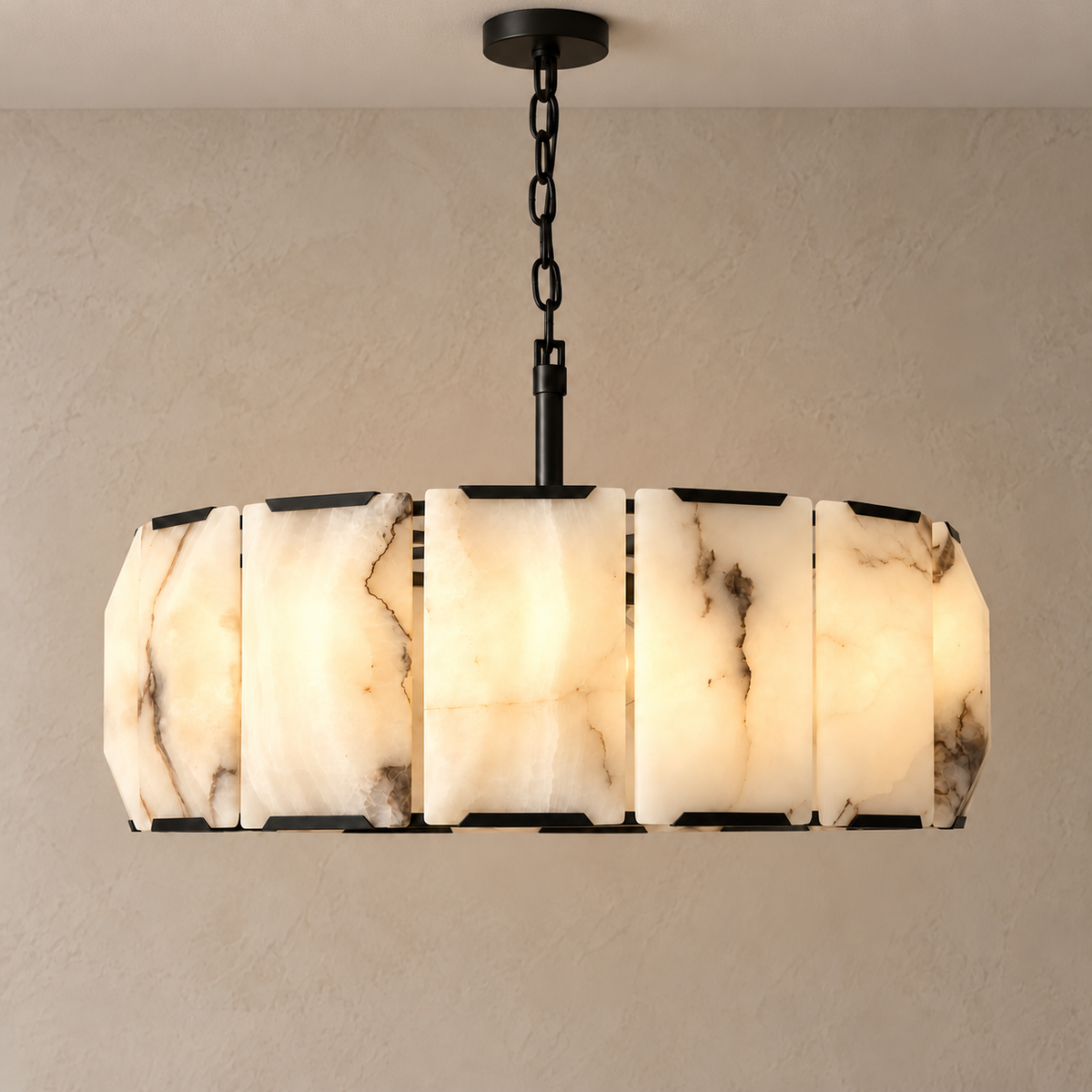 Halo alabaster chandelier illuminated, showing natural stone variation