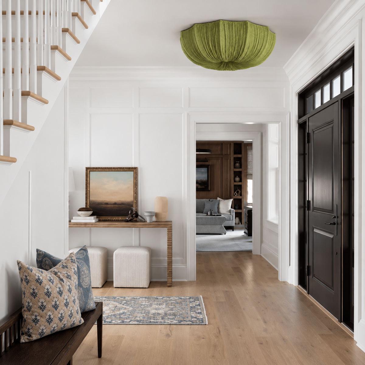 Sabina olive-green linen flush mount installed in a white entryway with a black front door.