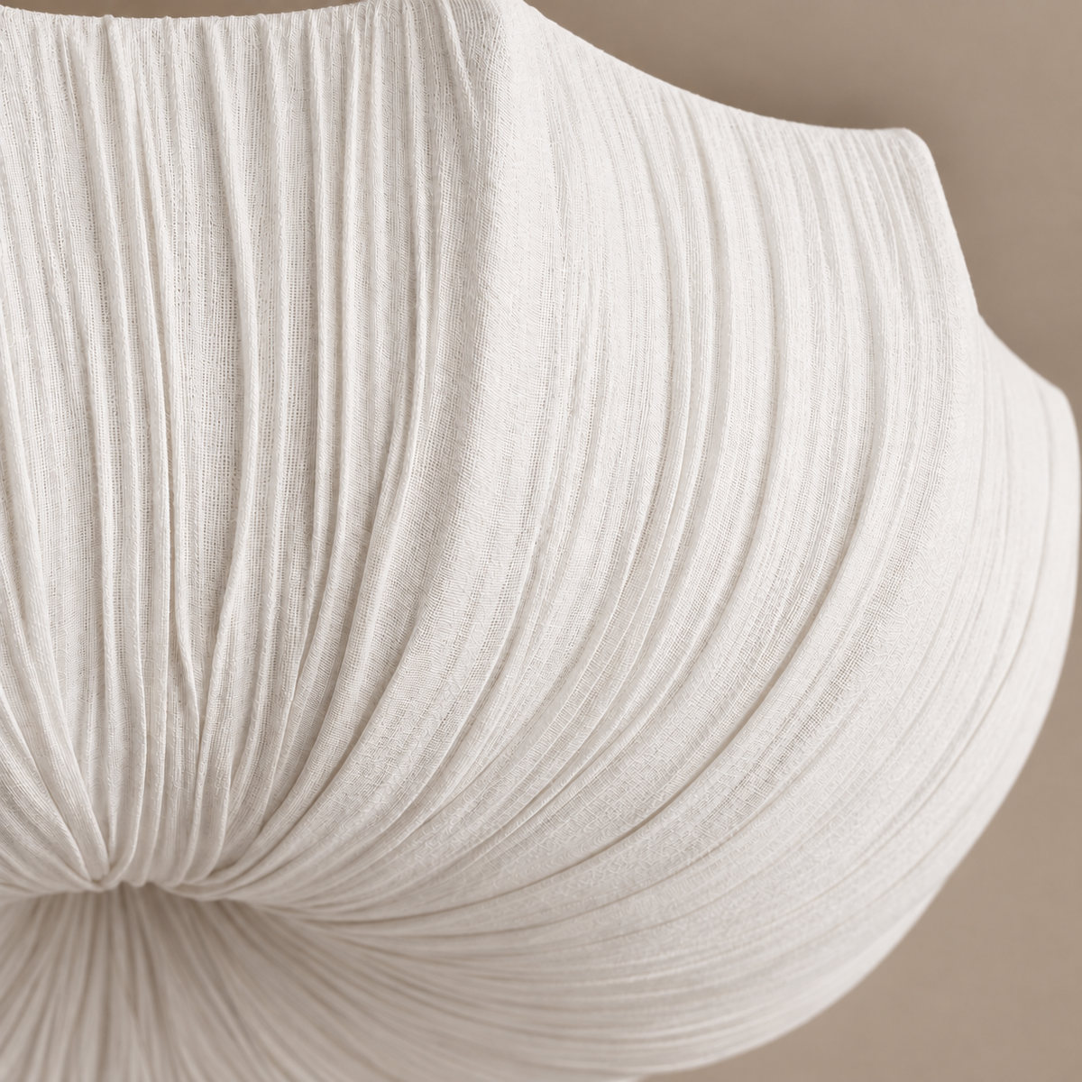 Close-up of the Sabina flush mount’s white linen weave and gathered folds.