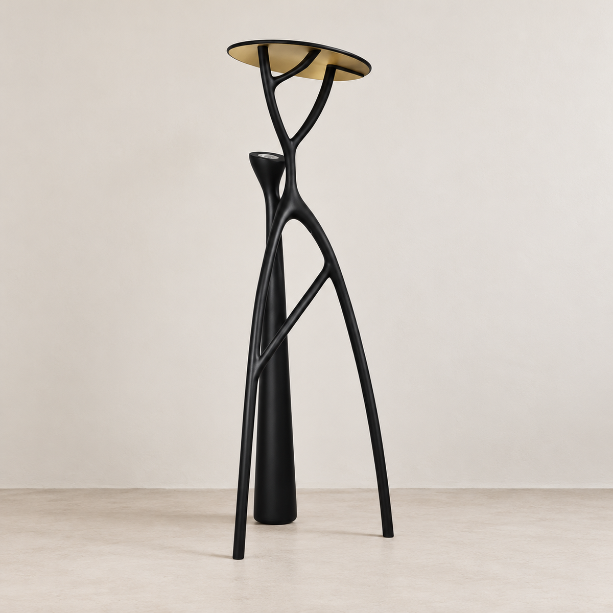 Black and gold Tree floor lamp with branching resin legs, switched off.