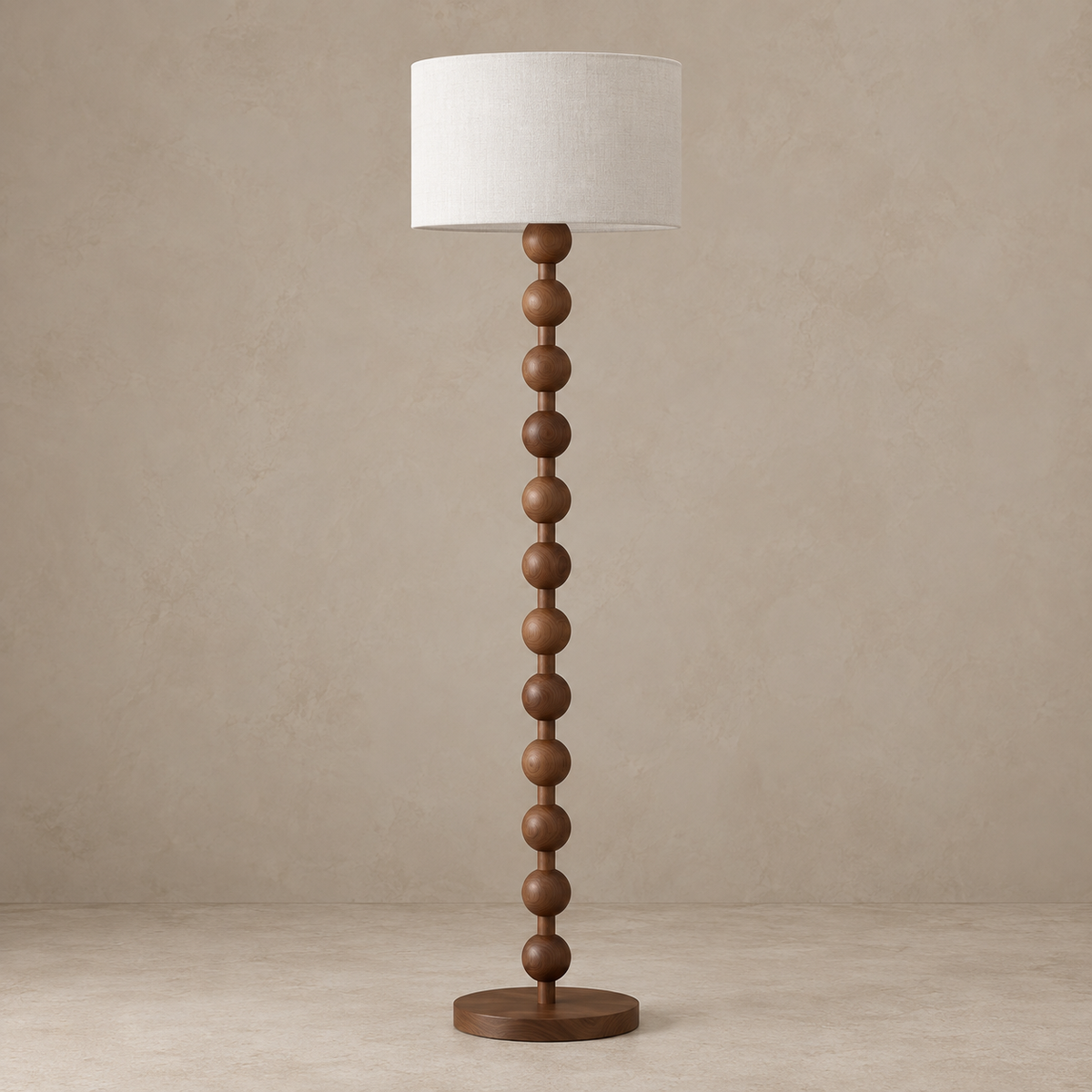 Sirmione walnut floor lamp switched off, with twelve wooden beads and a white linen drum shade.
