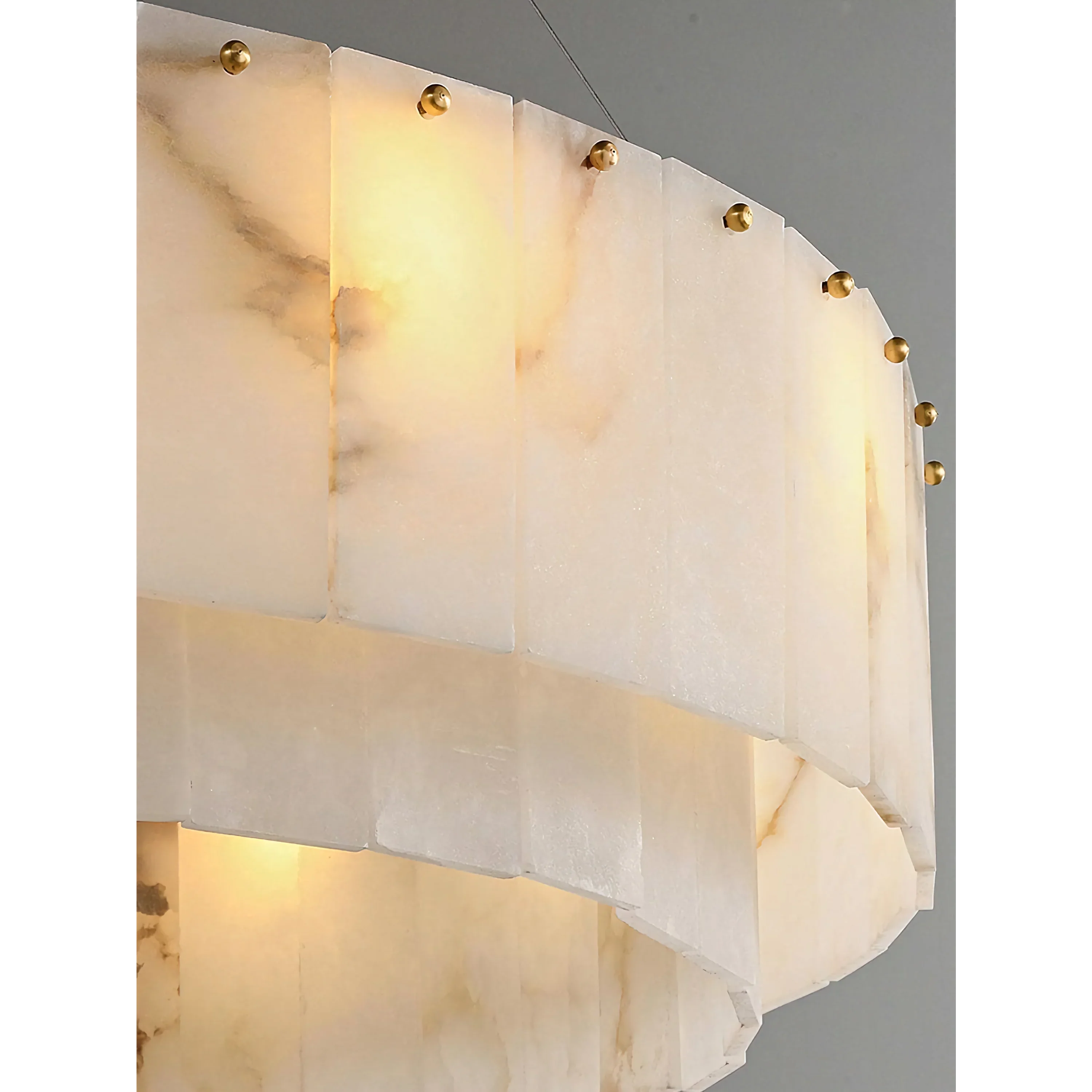 Brass stud and alabaster panel detail
