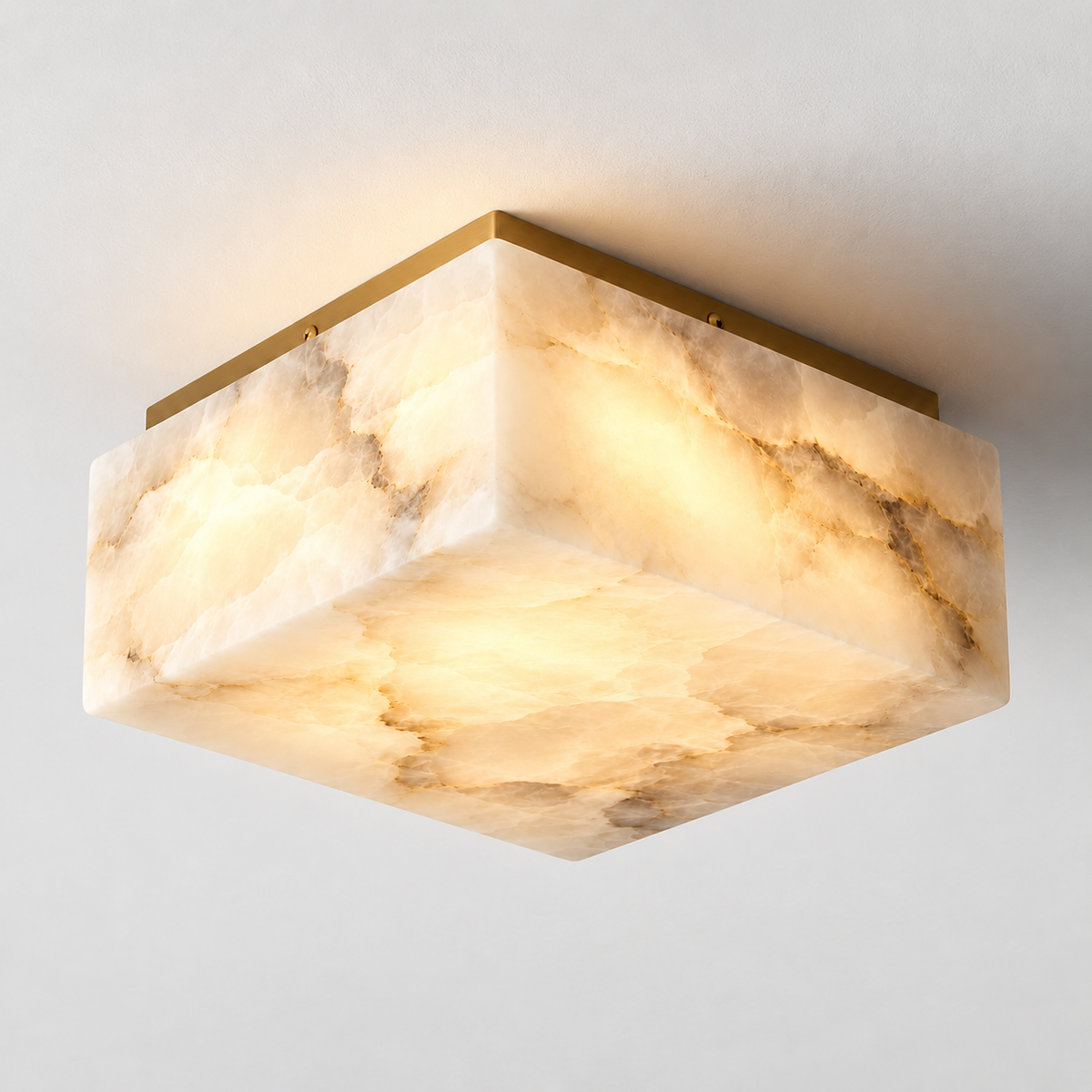 Illuminated square alabaster flush mount with gold frame and visible mineral layers.