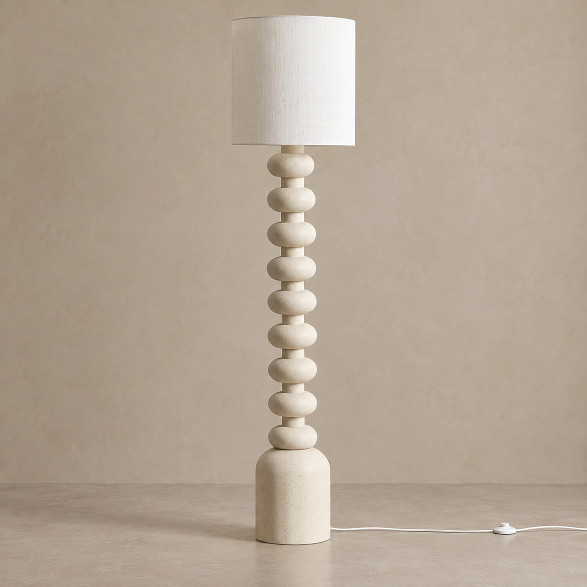 CL7774033 floor lamp with nine ivory resin segments and an unlit cylindrical fabric shade.