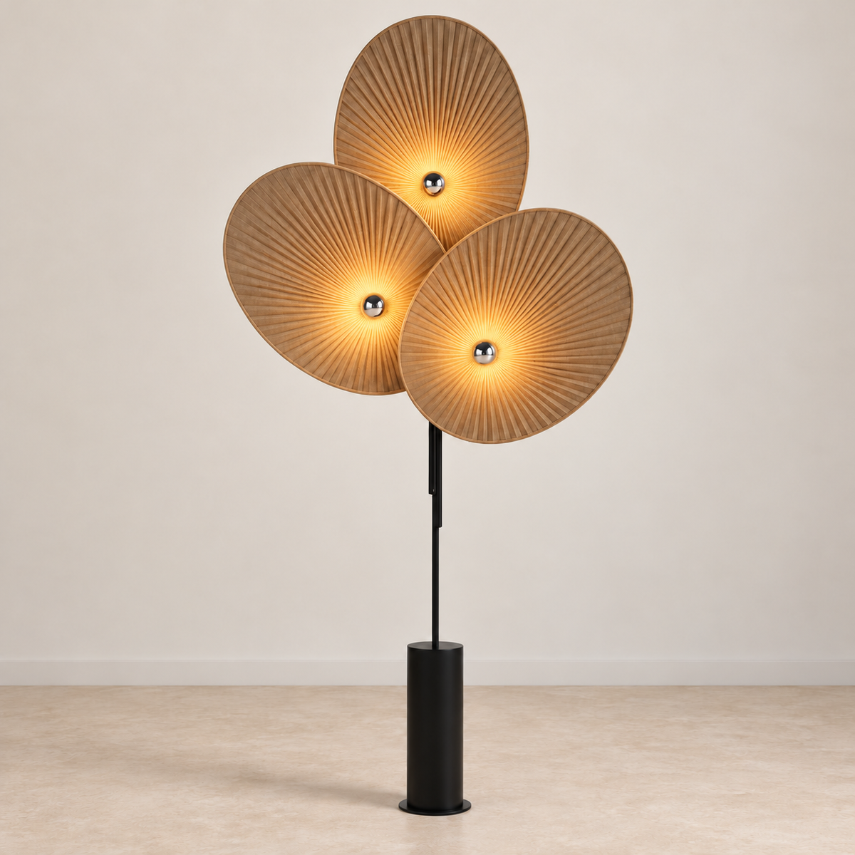 Svelo brown pleated floor lamp illuminated on a light beige background.